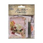 Packaged Tim Holtz Idea-Ology ephemera with tea cup design on a white background