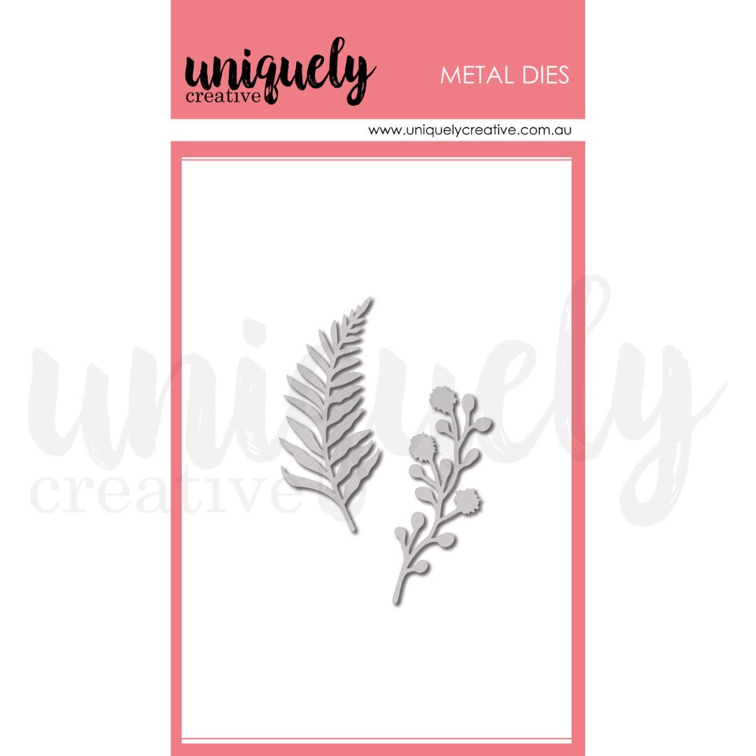 Uniquely Creative metal dies featuring a fern leaf and a small flowering branch, presented on a white card with a pink header.